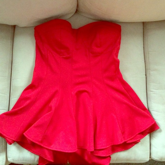 Red strapless peplum top bustier style. NEVER WORN