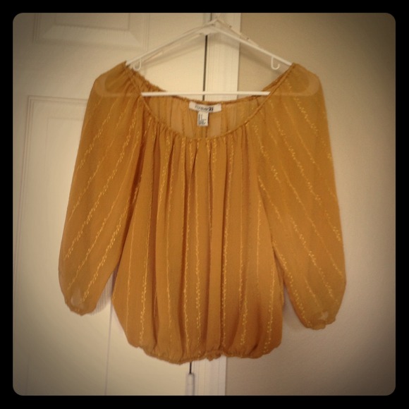 Mustard color top.