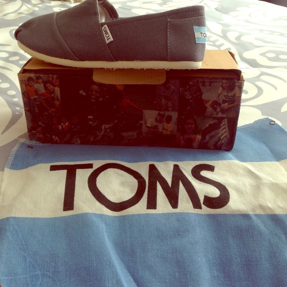 Brand new-still in the box TOMS.