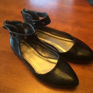 Black flats with studded ankle strap