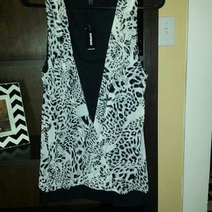 Express top with sheer overlay