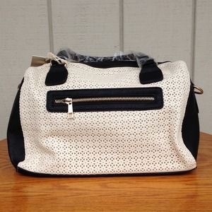 UNDER ONE SKY.  Two Toned perforated Satchel
