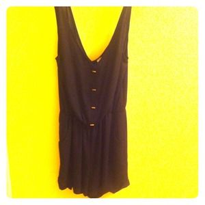 Black romper with gold buttons