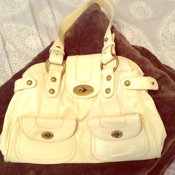 Patent leather look ivory handbag with gold detail