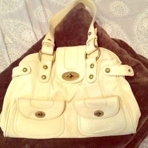 Patent leather look ivory handbag with gold detail