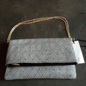 SOLD - NWT B&W textured fold-over clutch