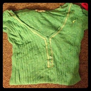 A hollister green long sleeved shirt.