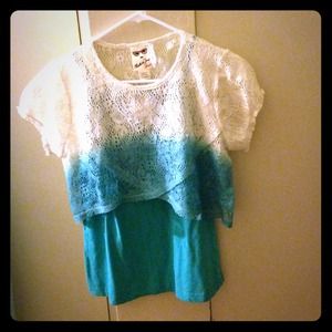 A blue and white crop top and a blue tank top set