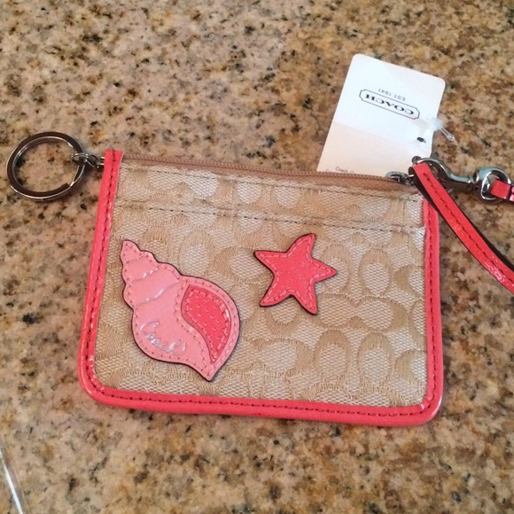 Mini coach wristlet with keychain