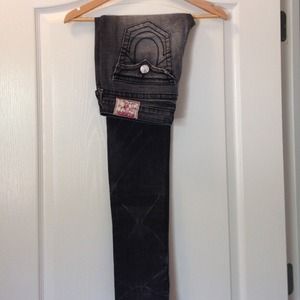 Tries religion black distressed skinny leg.