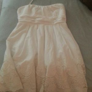 Short formal white dress.