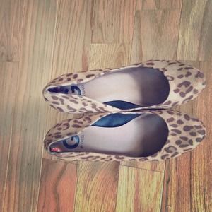 G by Guess cheetah print pumps, worn twice.