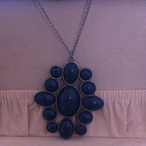 Long necklace with blue stoned pendant