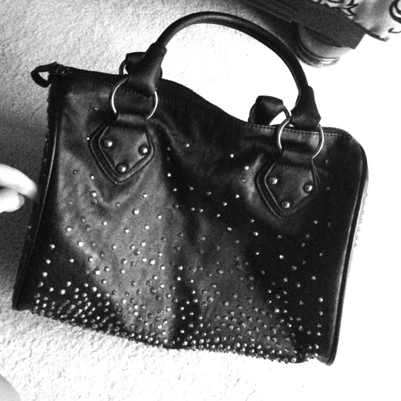 Black purse with crystals on it