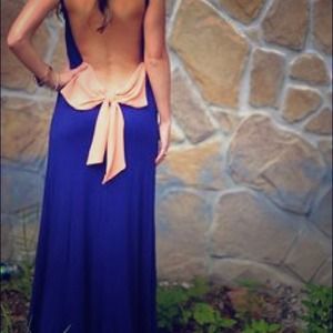 Shop Hope's navy plunge maxi dress with coral bow