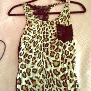 Cheetah tank top. 7  dollars. Only worn once.