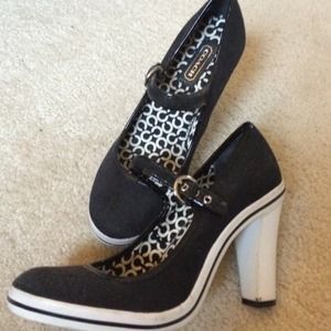 Size 6 1/2 authentic Coach sneaker heels.