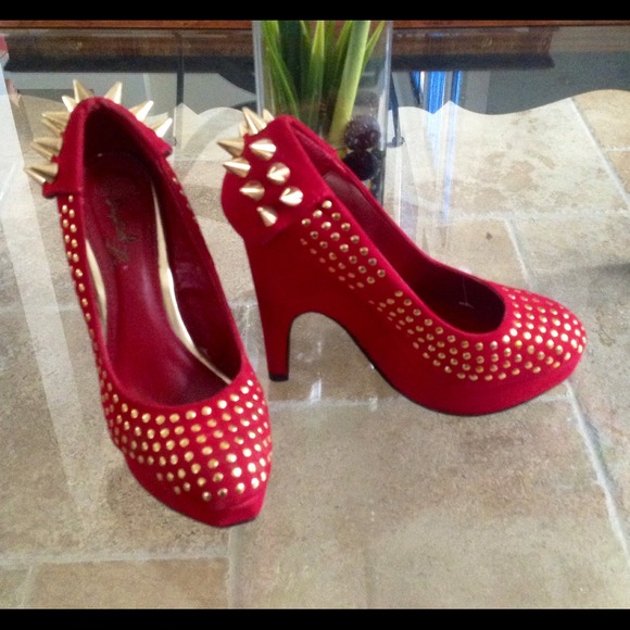 Red suede spiked shoes