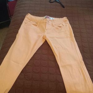 Peach colored skinny jeans