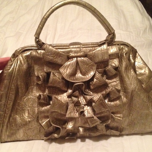 Gold Jessica Simpson purse