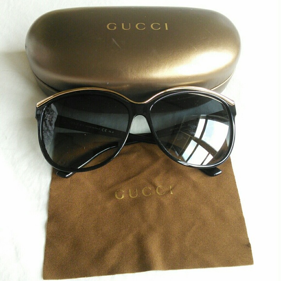 Gucci black sunglasses with metal frame