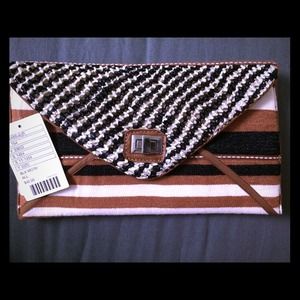 Brand new UO brown black and white clutch
