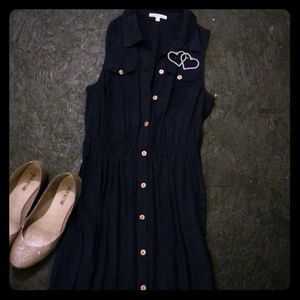 Super cute button up dress!