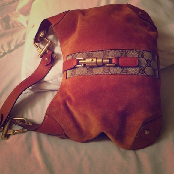 Gucci. Burnt orange , suede