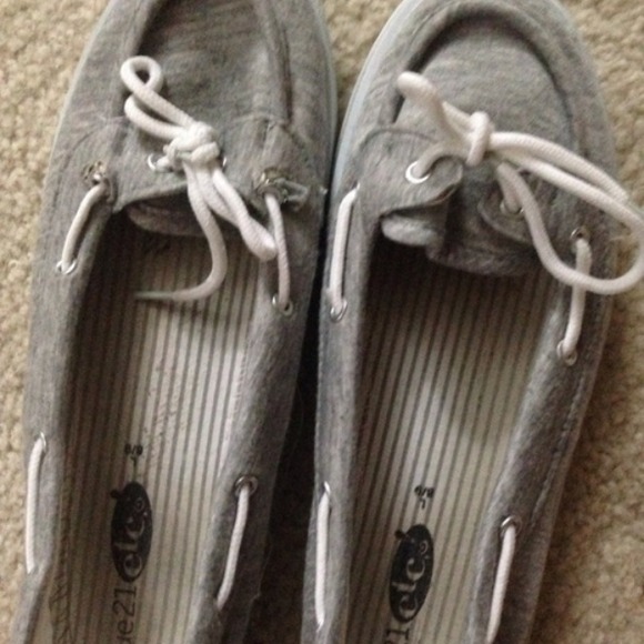 Grey boat shoes with laces
