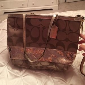 Gold coach bag