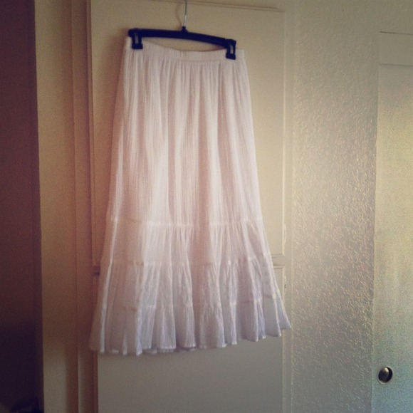 Two Eyelet Lined Summer Skirts.