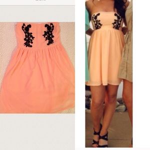 Orange-coral and black strapless dress