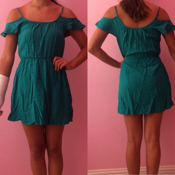 "Cold shoulder" green dress