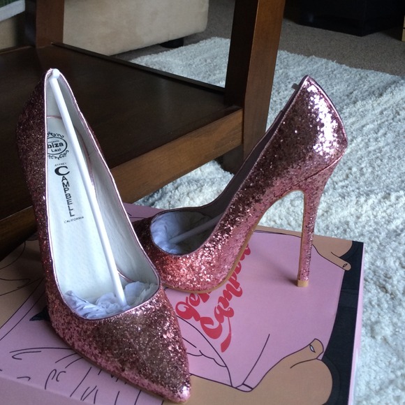 Pink glitter Jeffrey Campbell pumps.