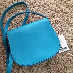 Cross body turquoise saddle bag