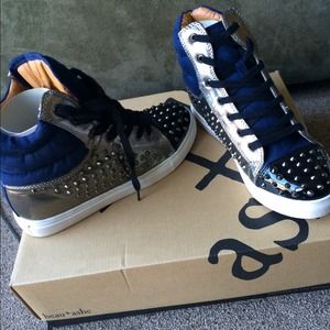 Beau+Ashe blue spiked high top sneakers.