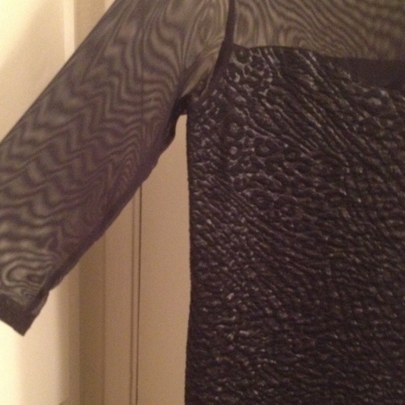 Cute black dress the material is very stretchy. - Picture 2 of 3