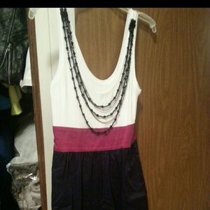 Express dress with detachable necklace.