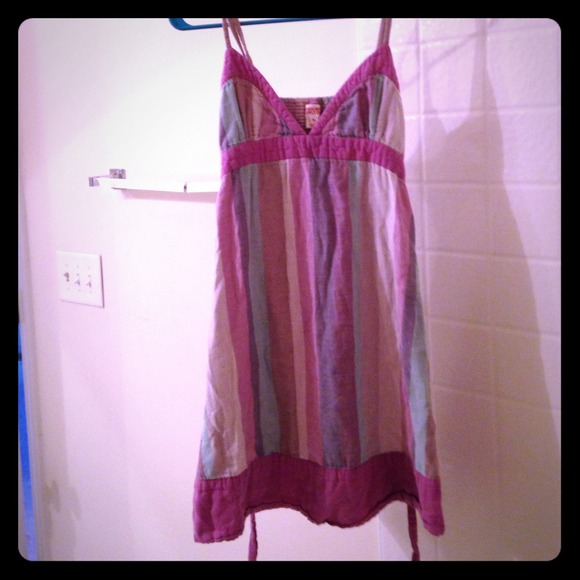 Spaghetti strap purple dress.