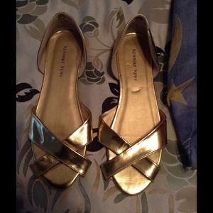 Gold flats!!  Never worn