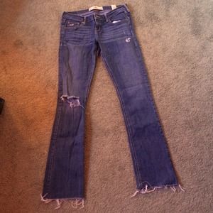 Hollister medium wash destroyed jeans