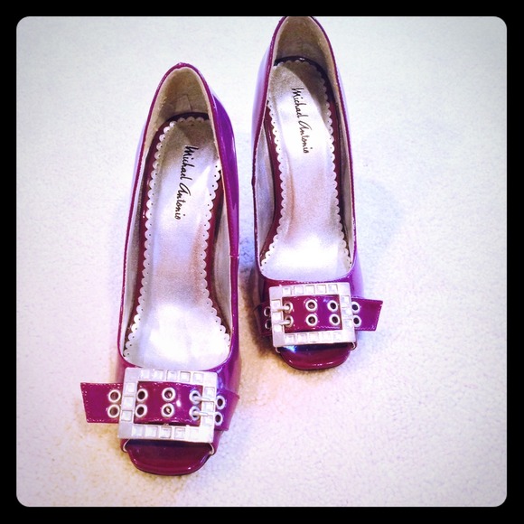 Purple peep toe heels with gem stones.