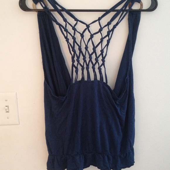 Navy top with open intricate design in the back!