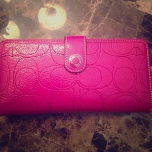 Coach wallet..used..pink in color