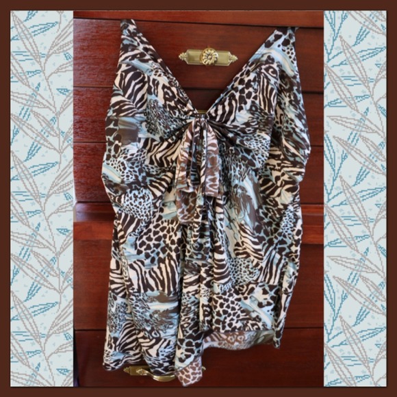 Asymmetrical Animal Print Top in Size 1X.