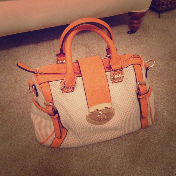 Square lock messenger purse.