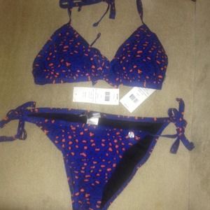 Two pieces; bikini top and bottom. Never worn