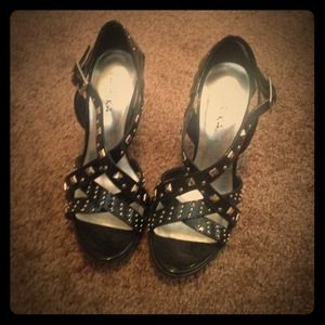 Studded patent leather heels