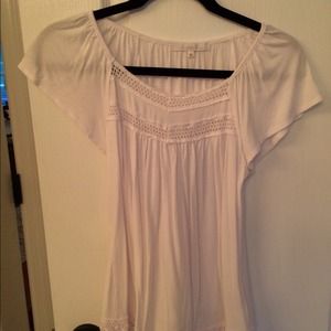 Cute and casual cotton and crochet T-shirt.