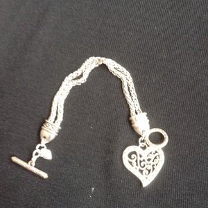 Silver bracelet with heart charm
